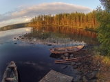 <h5>Järvimaisema</h5><p>Ilmasta otettu kuva Pohjois-Karjalasta. Ilta-aurinko alkaa hieman näkymään metsän väreissä. Tunnus: gopr2840</p>